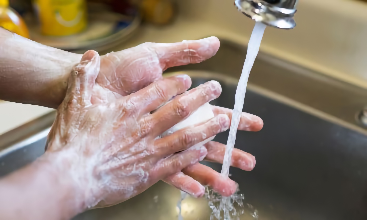 close up of handwashing in a sink